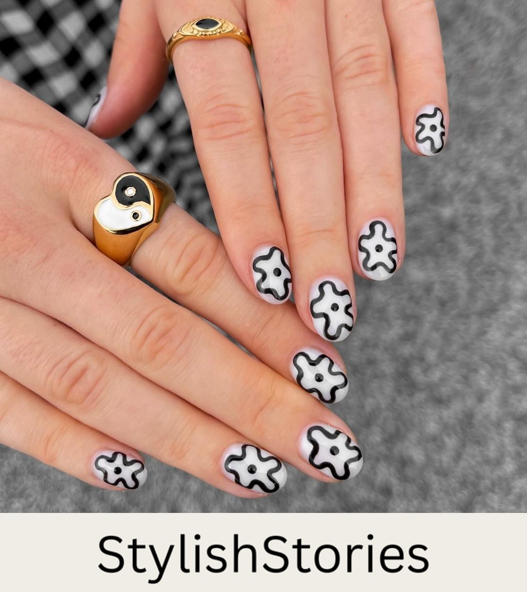 Elegant Squiggly Black Flower Manicure