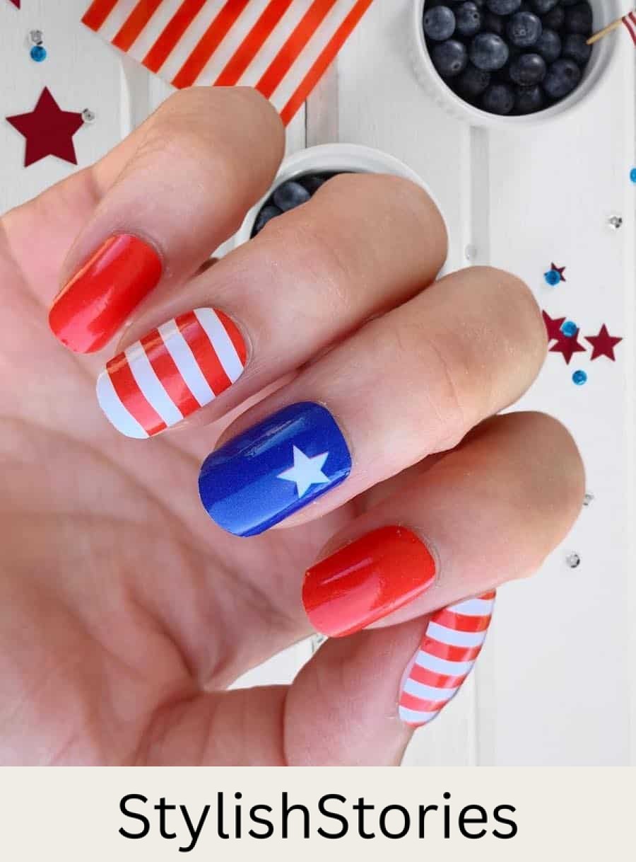 short nails with red polish, red and white striped nails, and blue nails with a white star