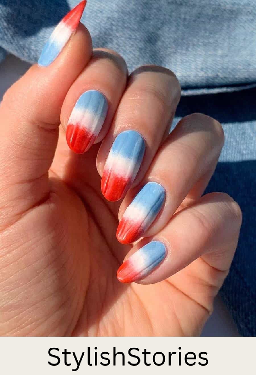 medium round nails featuring red, white, and blue popsicle ombre art