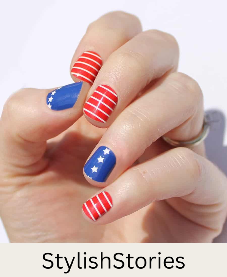 short nails with red and blue polish with white stars and stripes