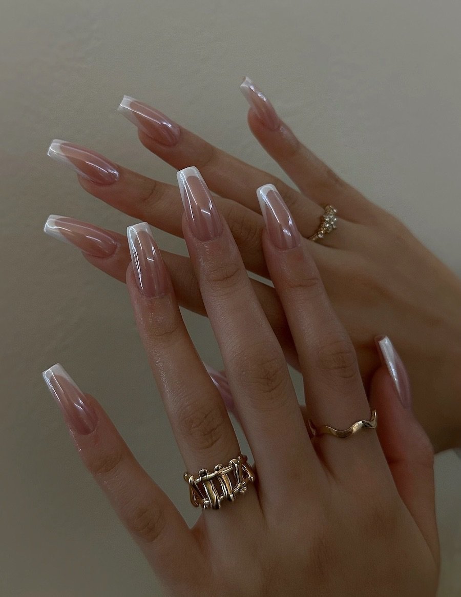 Long coffin nails with a classic French manicure and a chrome finish