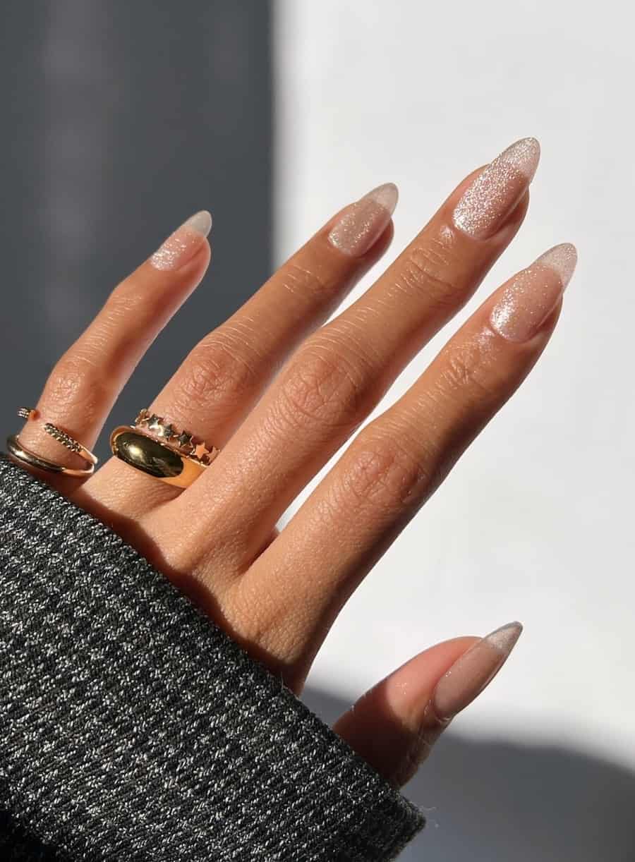 Medium almond nails with a silvery velvet finish