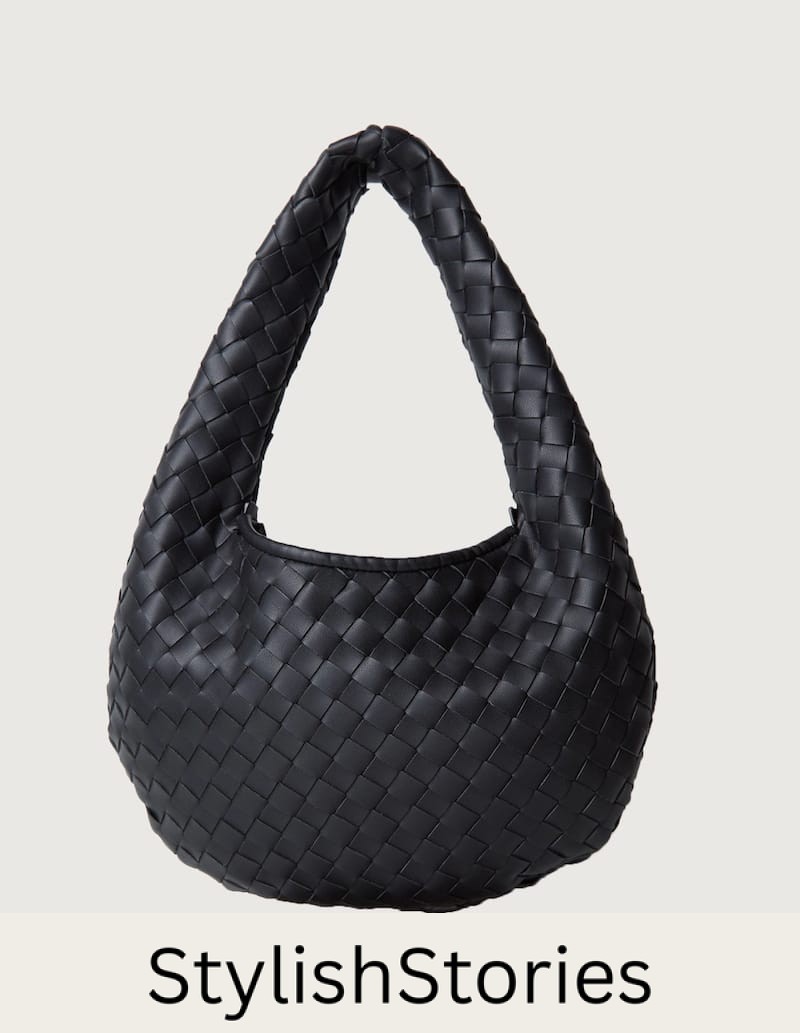a black woven hobo bag that's a look allike of the Bottega Veneta Jodie bag