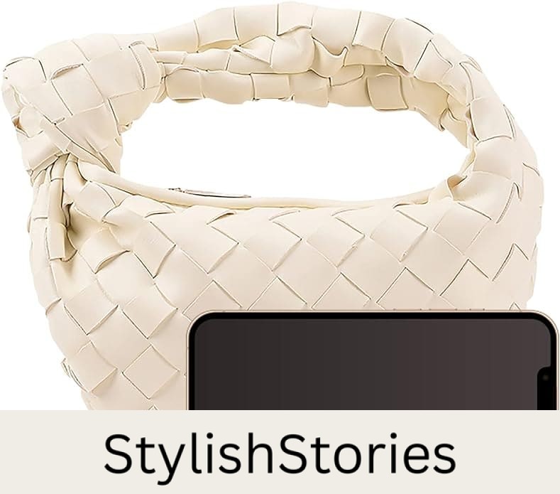 image of a small ivory woven bag with a knot handle and a phone in front