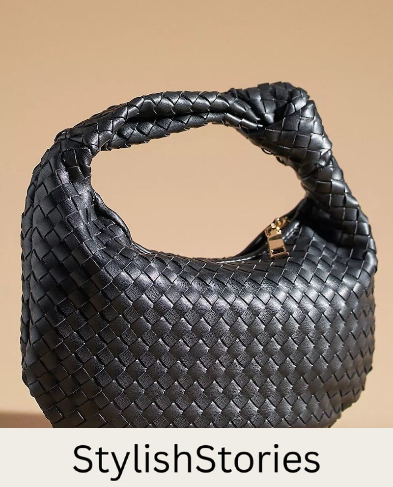 a woven mini hobo satchel bag in black that's a dupe of the Bottega Veneta teen Jodie bag