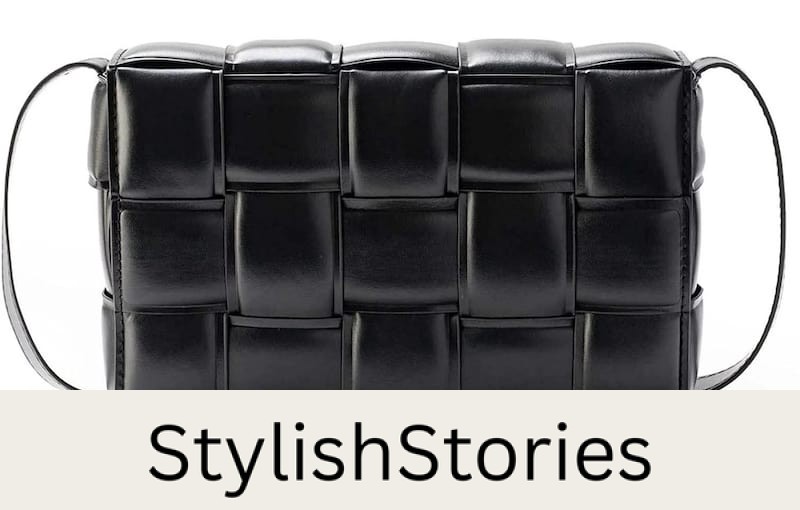 image of a padded black woven shoulder bag that is a dupe of the Bottega Veneta cassette bag