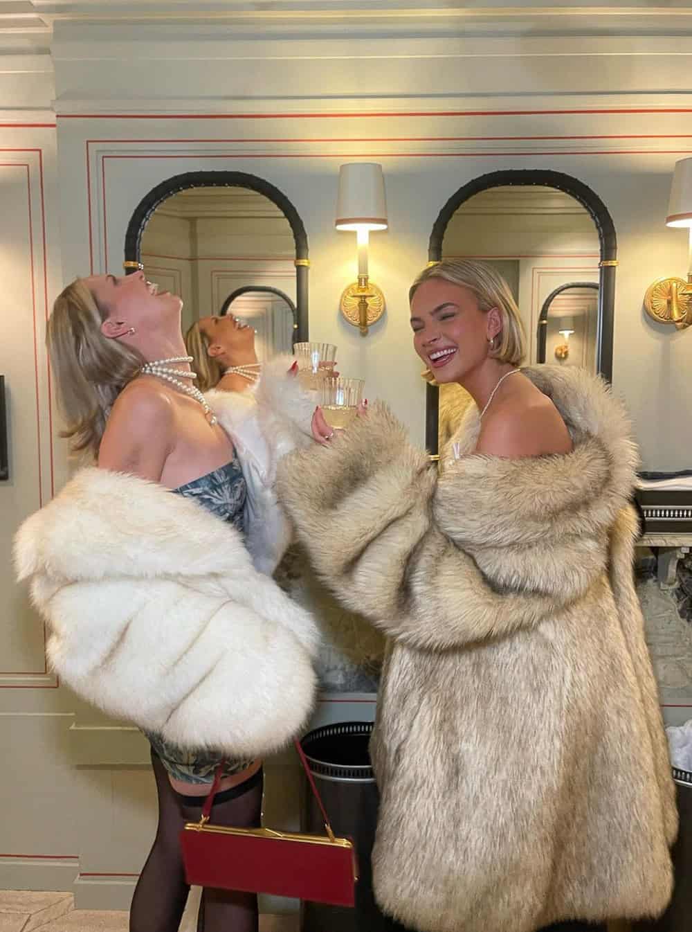 Two women dressed up as mob wives on Halloween.