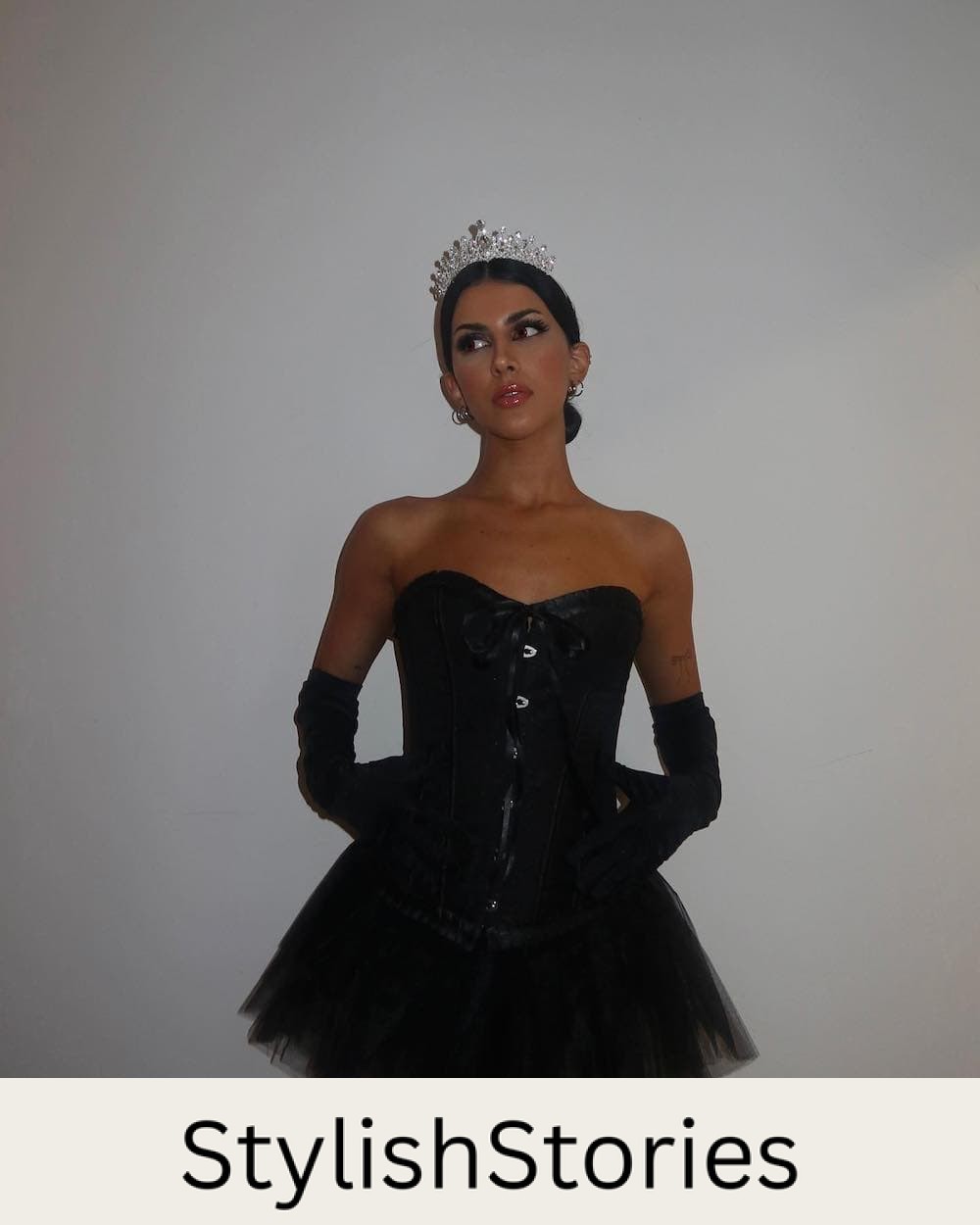 a woman dressed as a black swan