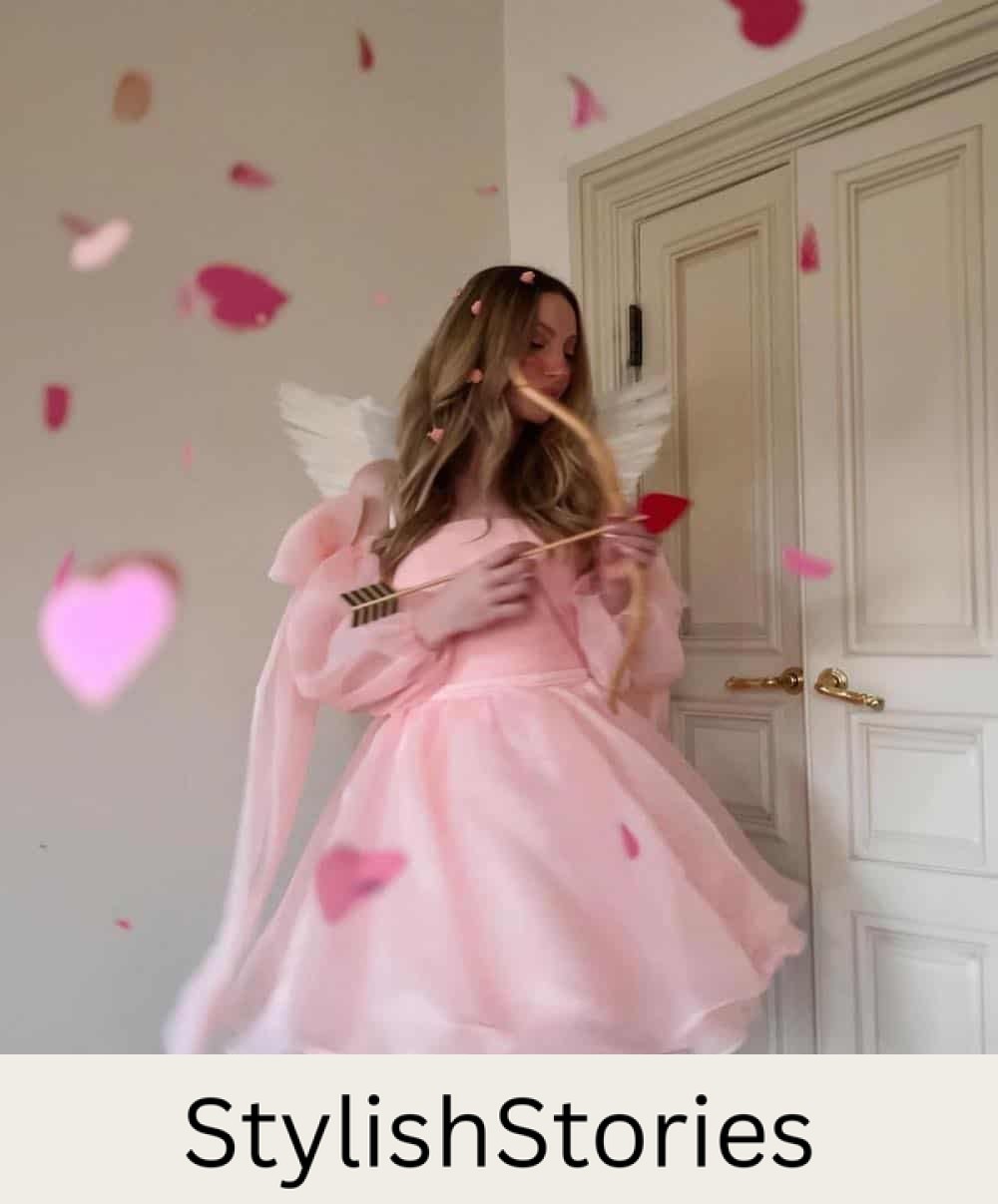 a woman dressed as cupid