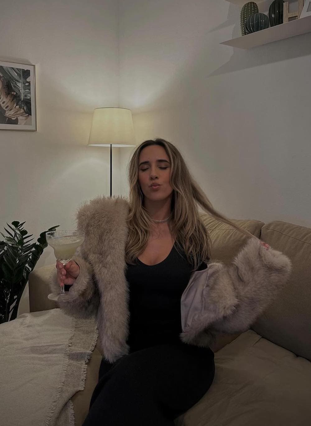 a woman dressed as a mob wife