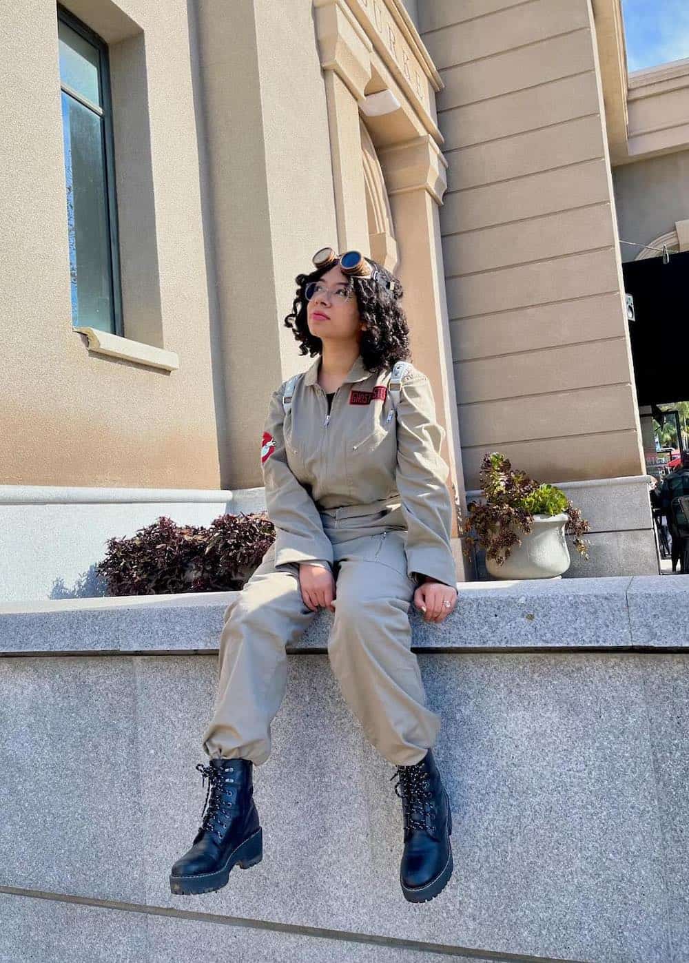 a woman dressed as a ghostbuster