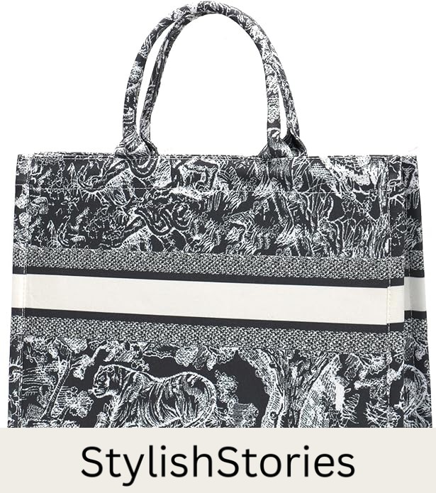 Image of a black tapestry printed tote bag with stripe across the center