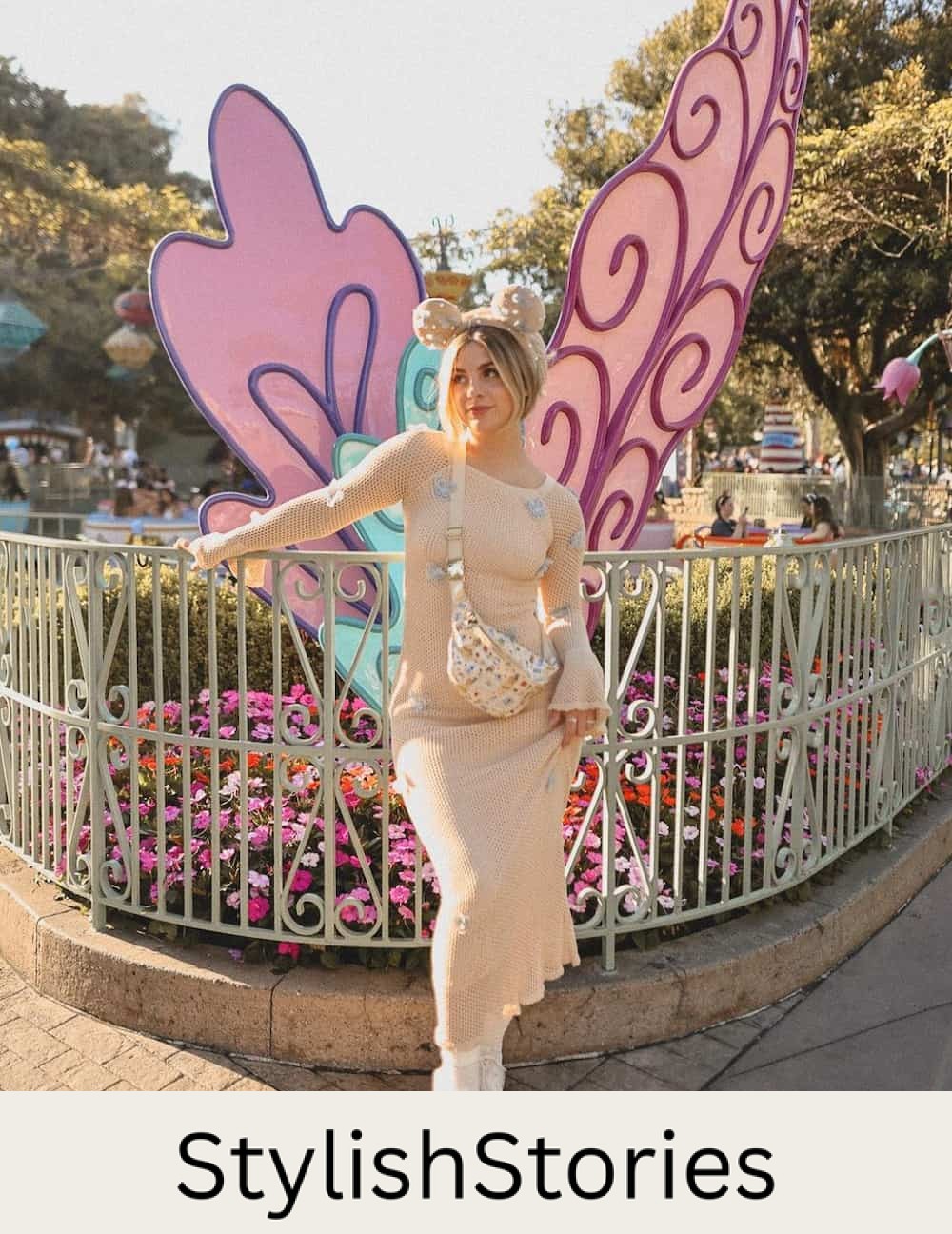 woman wearing a crochet midi dress with sneakers and Minnie Mouse ears at Disneyland