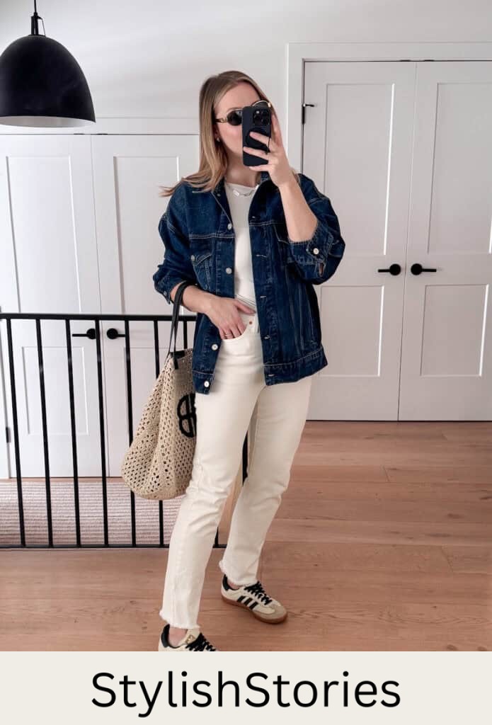 Christal wearing white jeans, a white tee, a denim jacket and sneakers.