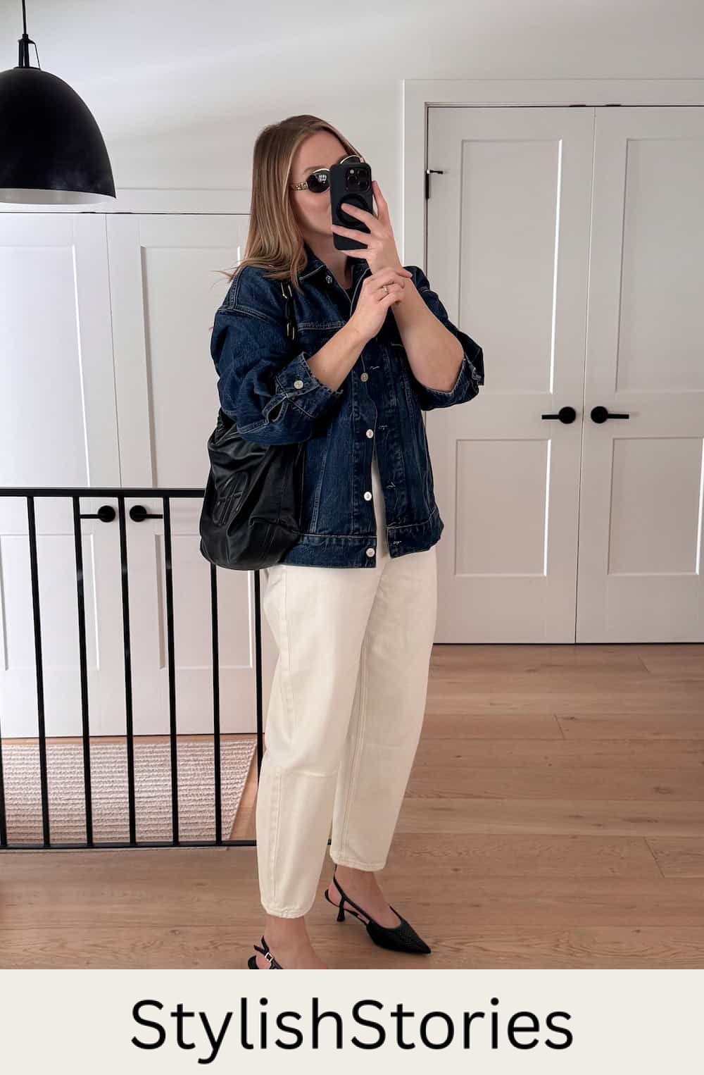 Christal wearing white jeans, a denim jacket and kitten heels