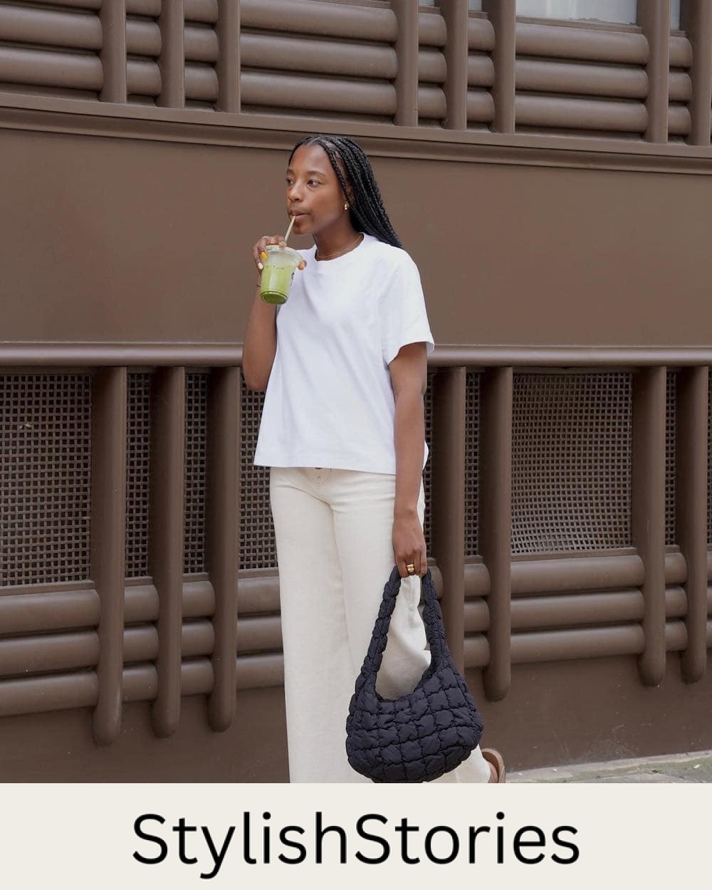 Woman wearing wide leg, white jeans and a white t-shirt with Birkenstocks.