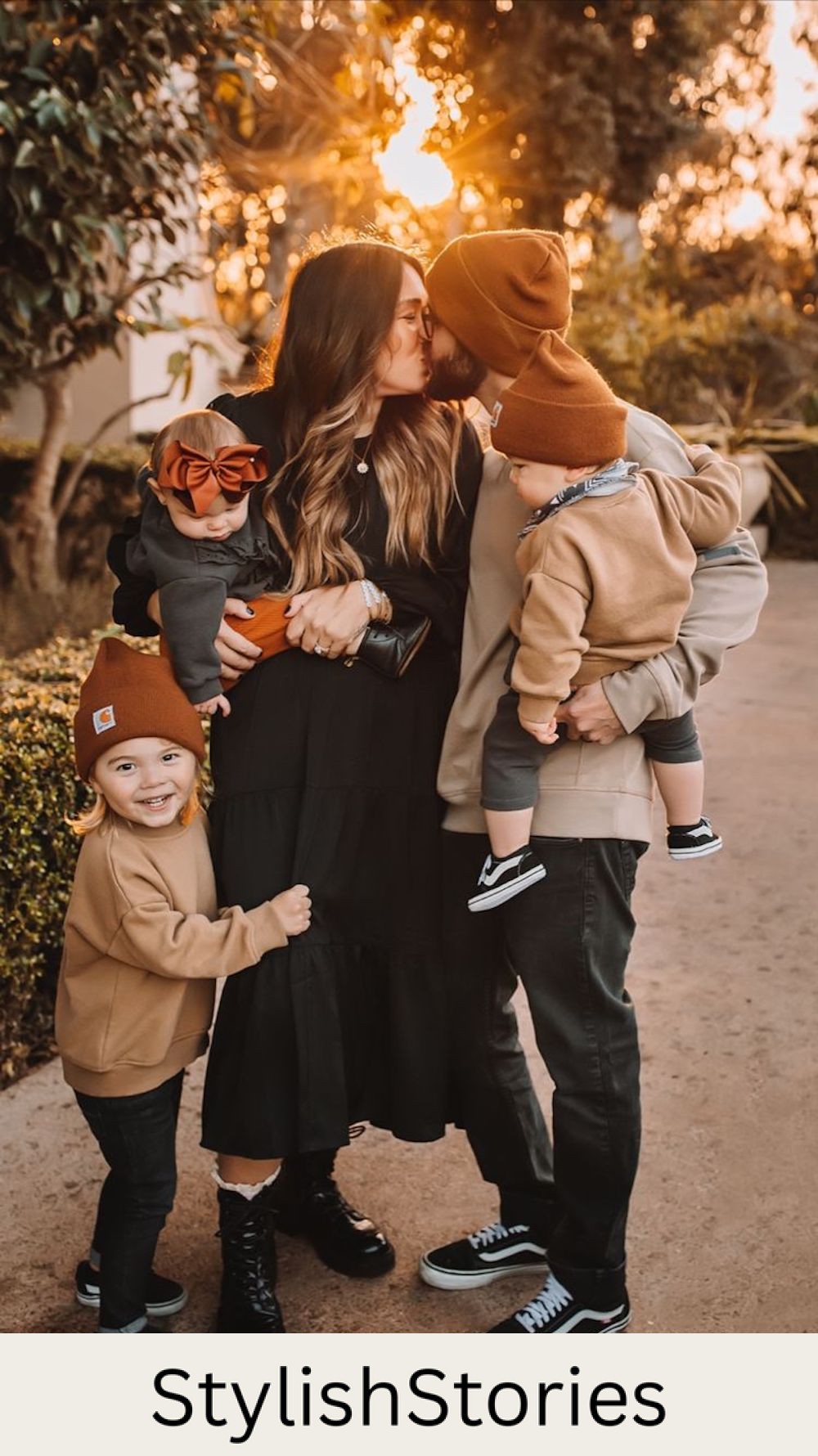image of a family in casual sweatshirts and beanies for a fall family photoshoot
