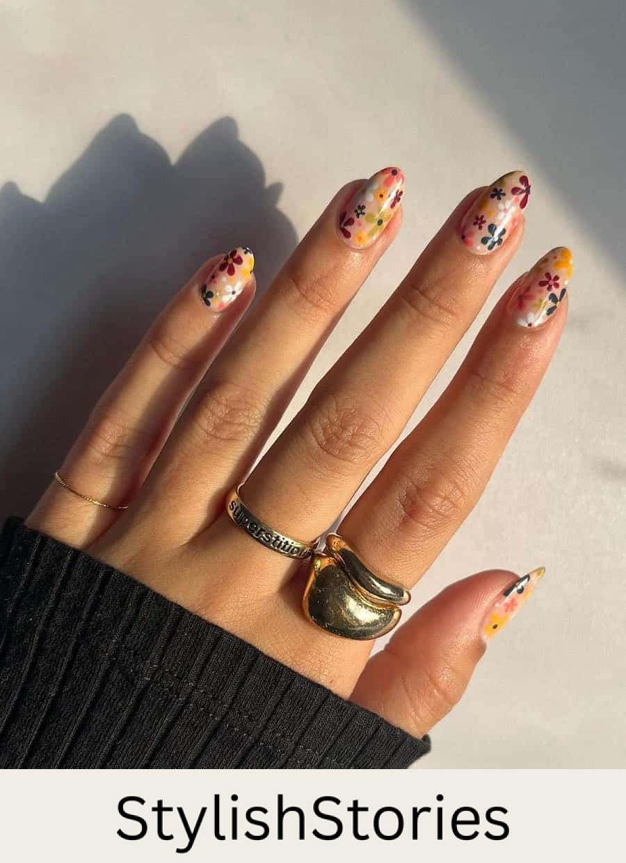 medium round nails featuring retro style floral art in a fall palette
