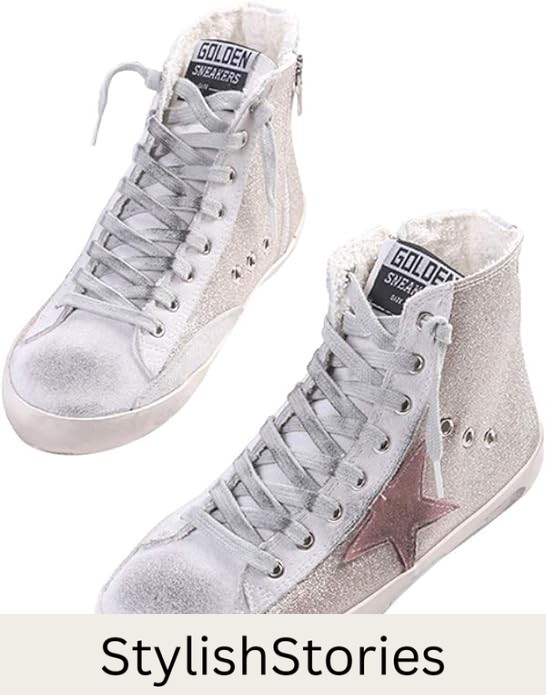 image of a pair of white distressed high top sneakers with a star detail on the side