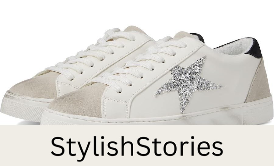 image of a while Golden Goose dupe sneaker with suede details and a glittery silver star on the side