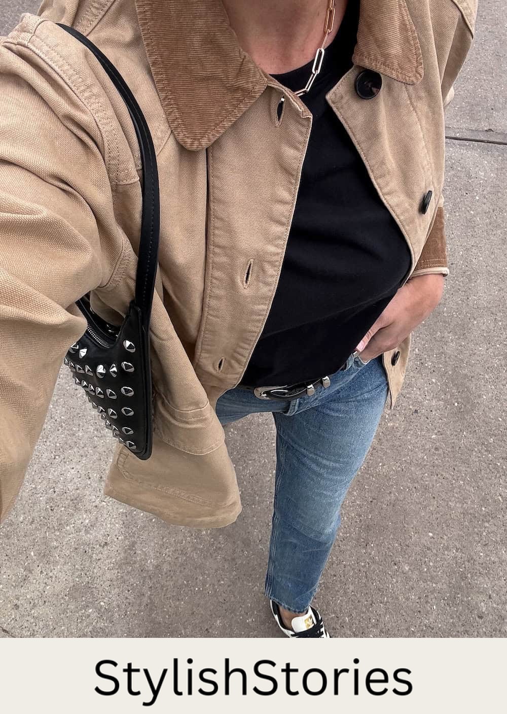 Christal wearing jeans, a black tee, a corduroy jacket and sambas.