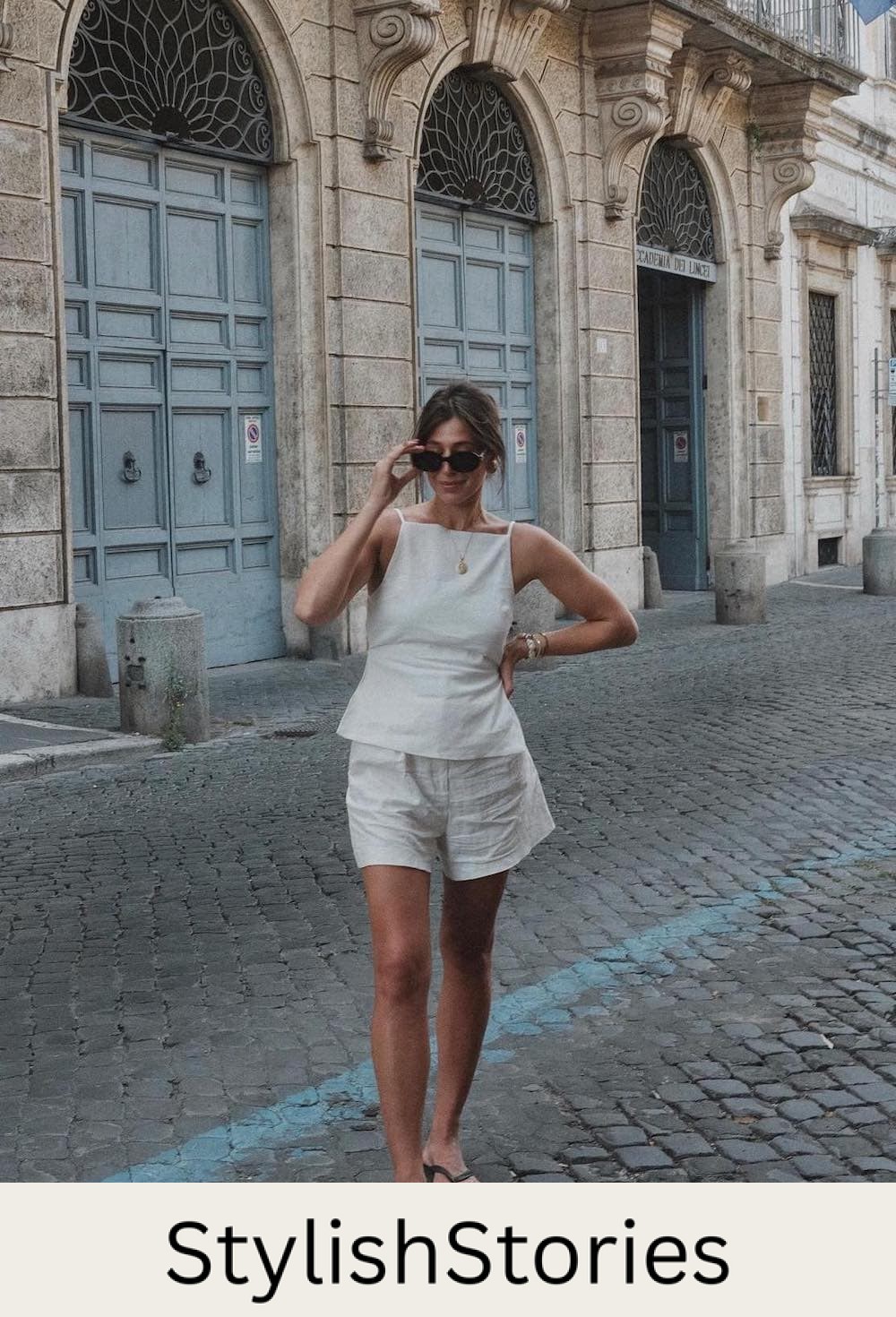Woman wearing an oatmeal colored linen short set with sandals.
