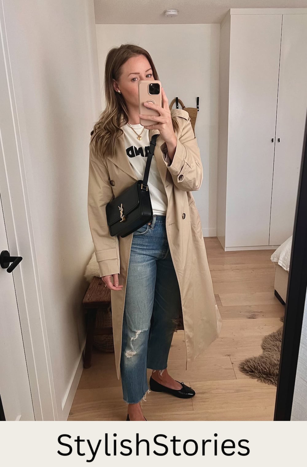 Christal wearing jeans, ballet flats, a graphic tee and a long coat.