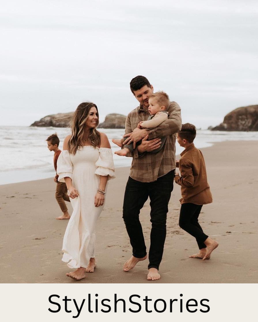 image of a neutral family photoshoot with a woman in a white maxi dress, the dad in a brown top and black jeans, and children in neutral clothing