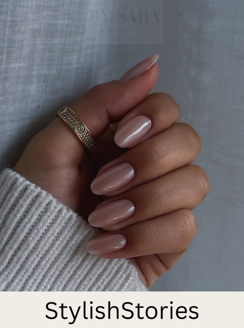 short nude round nails with a pearly chrome finish