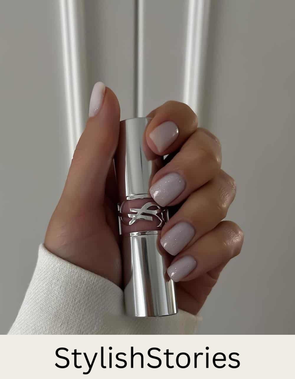 short white nails with glitter topcoat