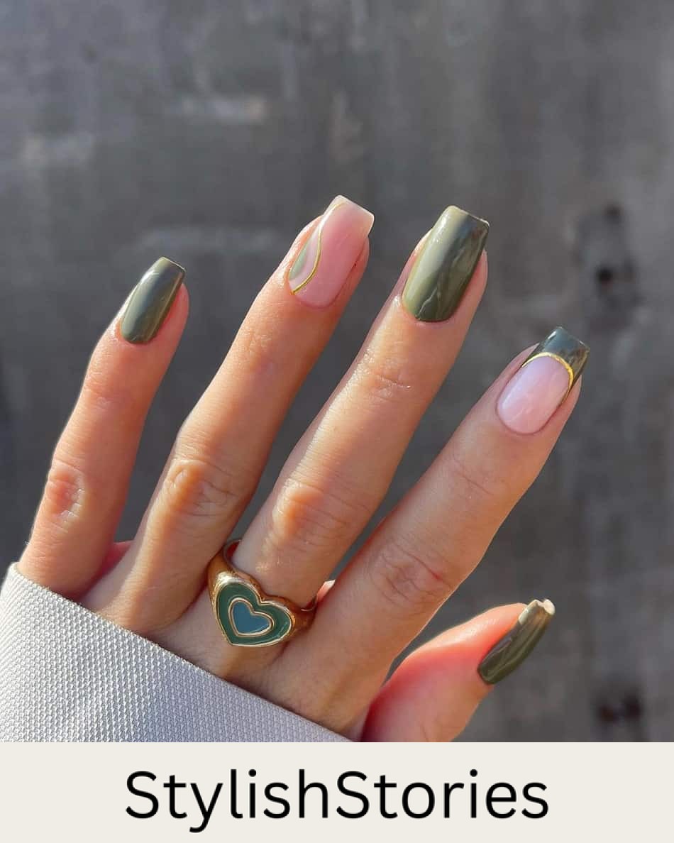 hand with short square nails with olive green and nude accents