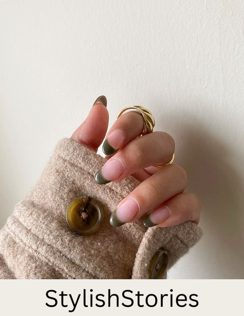 hand with olive green French tip nails