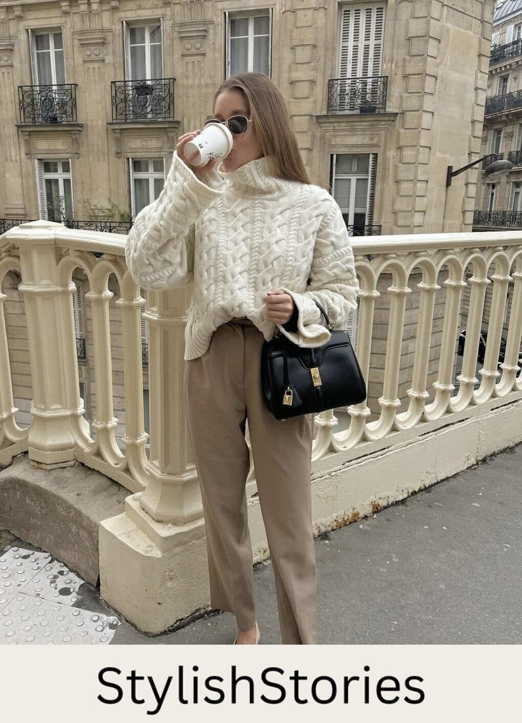 french woman wearing a knit ivory sweater with beige trousers and two-tone ballet flats