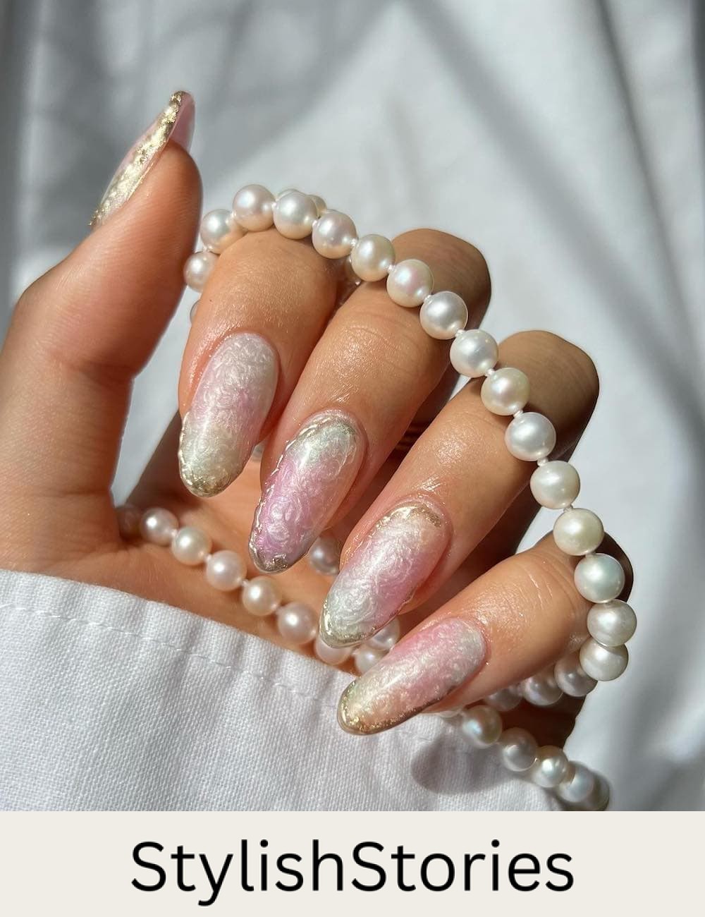 long almond nails with iridescent shades and a pearly finish
