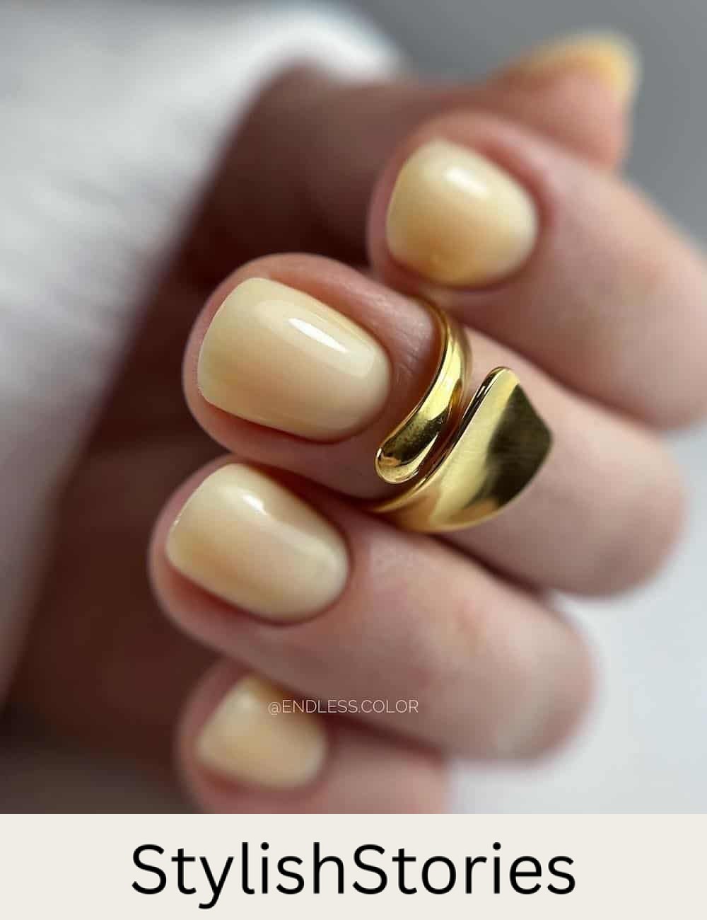 short round butter yellow nails