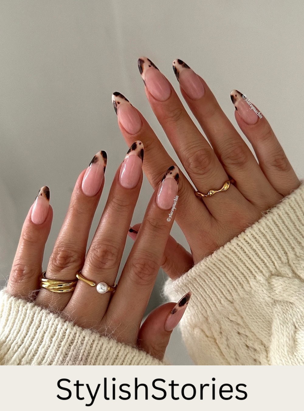 nude almond nails with animal print tips