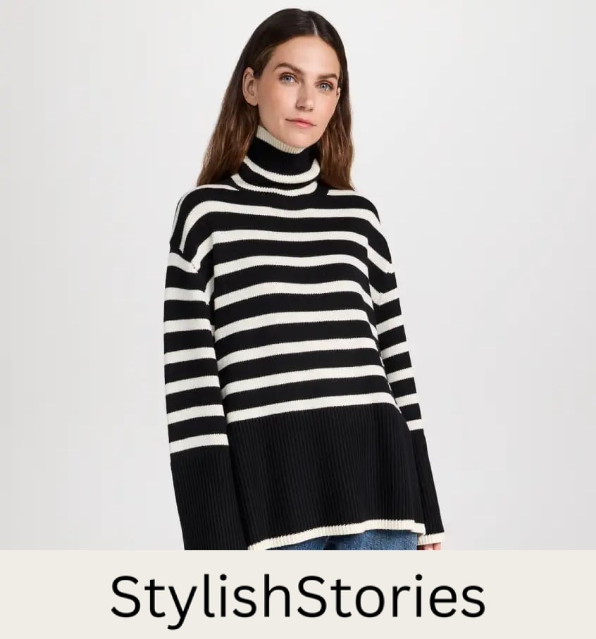 woman wearing a black and white striped oversized turtleneck
