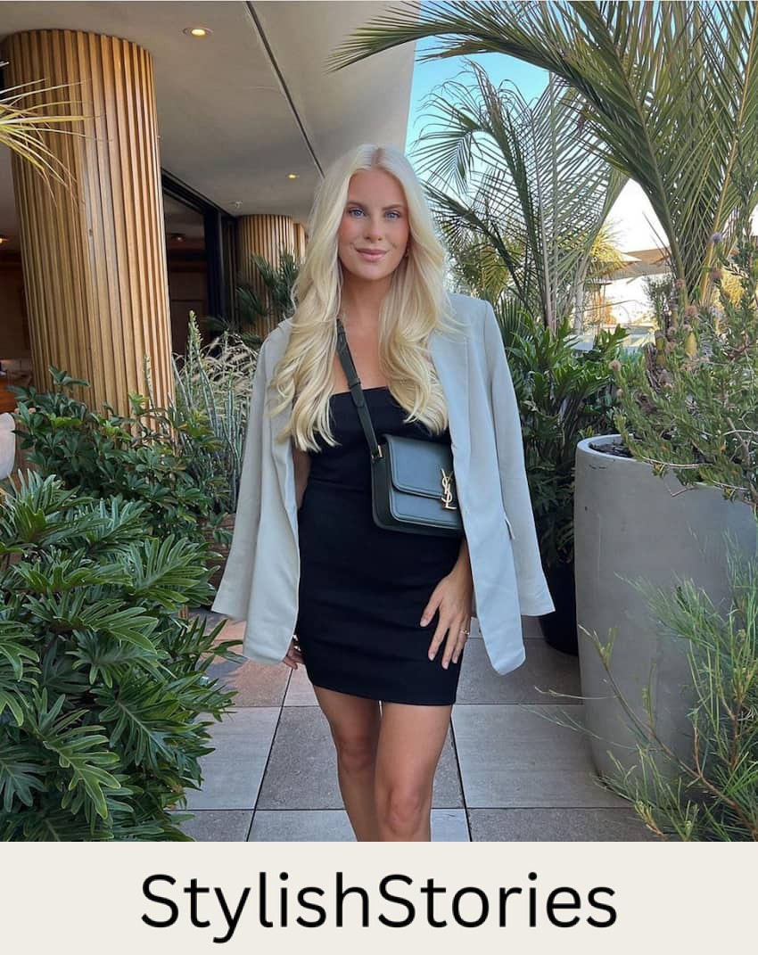image of a woman with long blonde hair wearing a little black dress, oversized beige blazer, and a designer crossbody bag