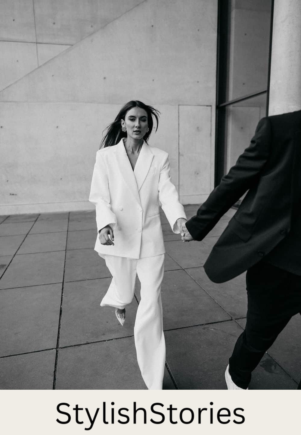 engagement photos featuring a couple wearing suits