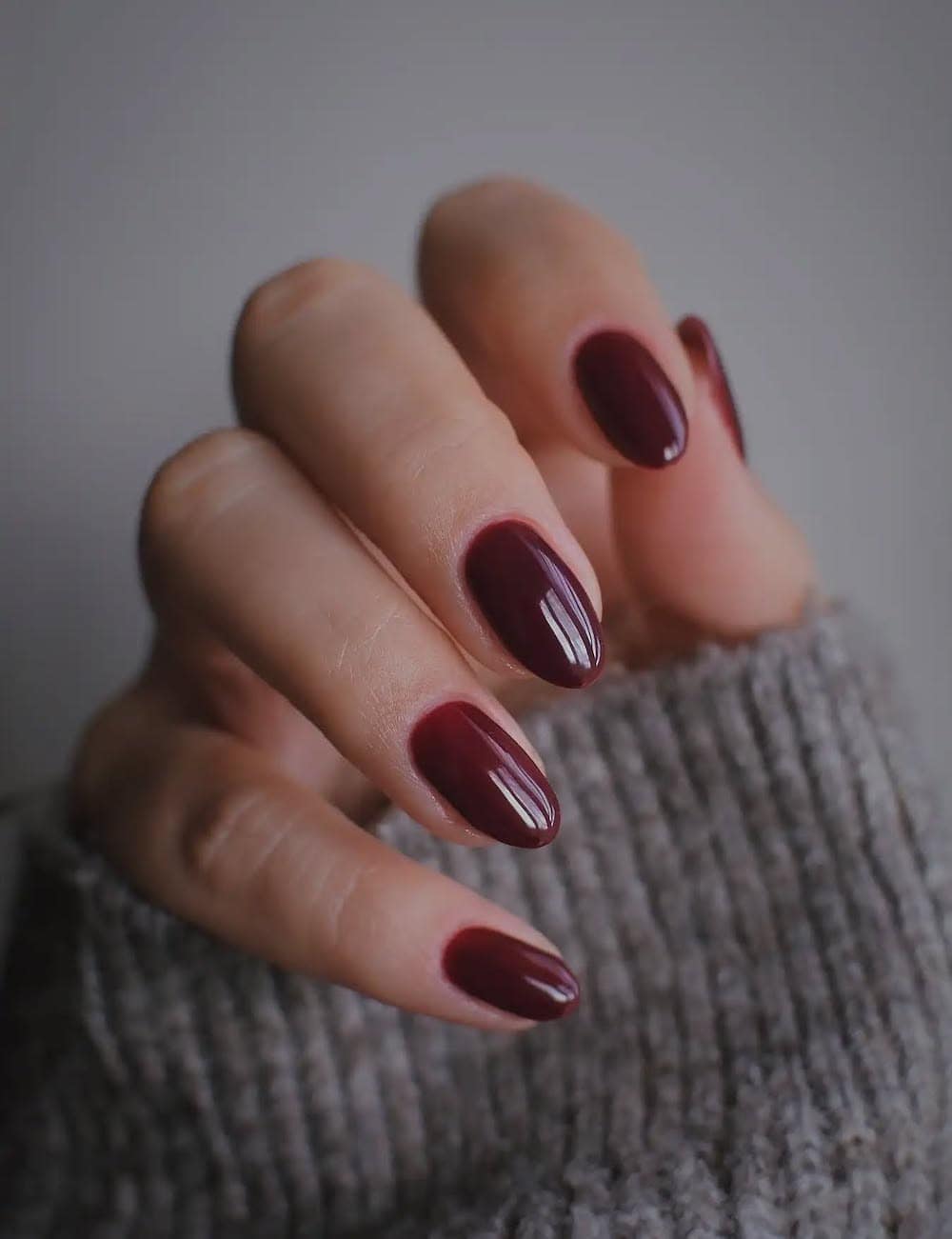 short dark red almond nails