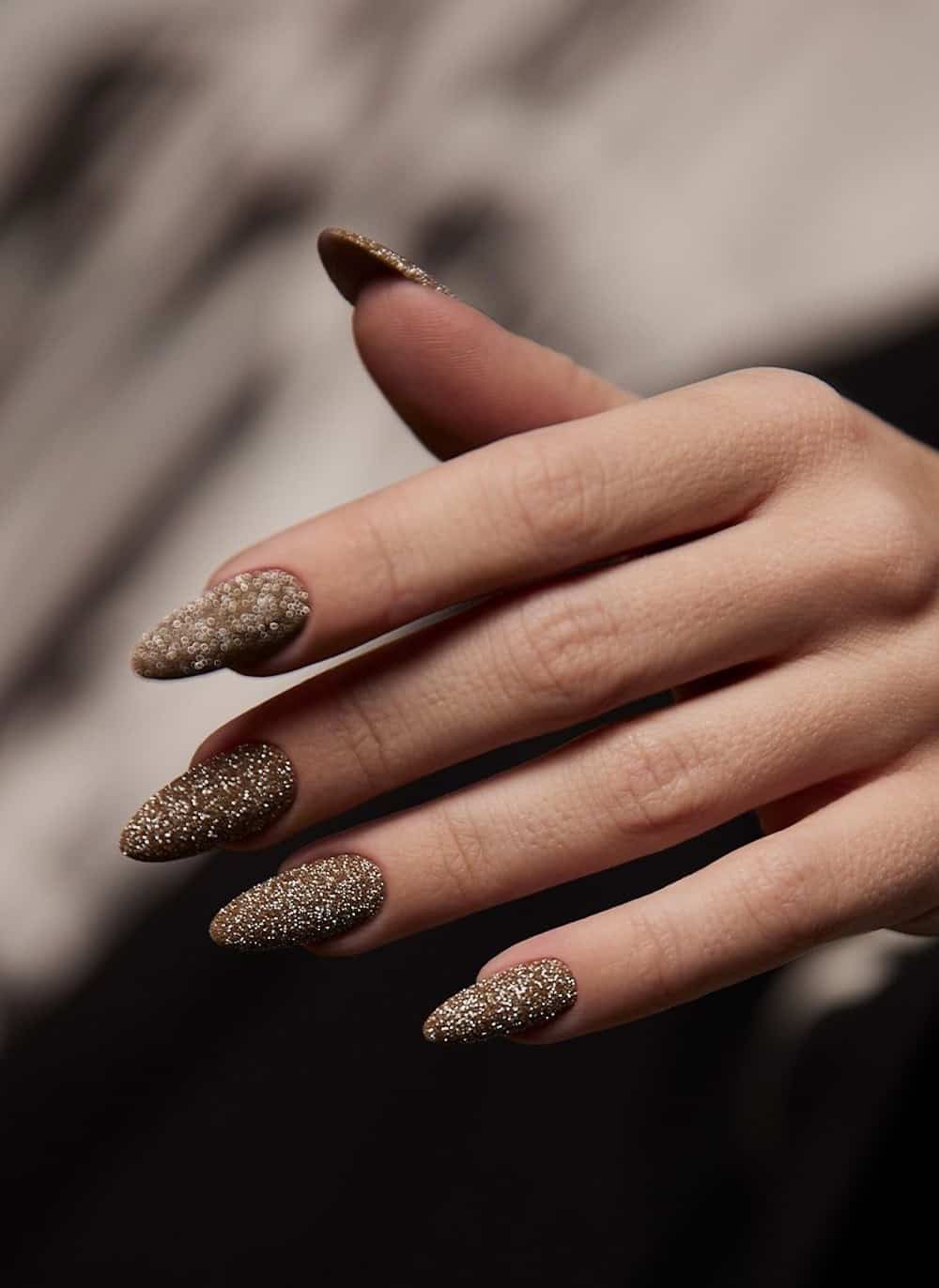 long gold glitter almond nails