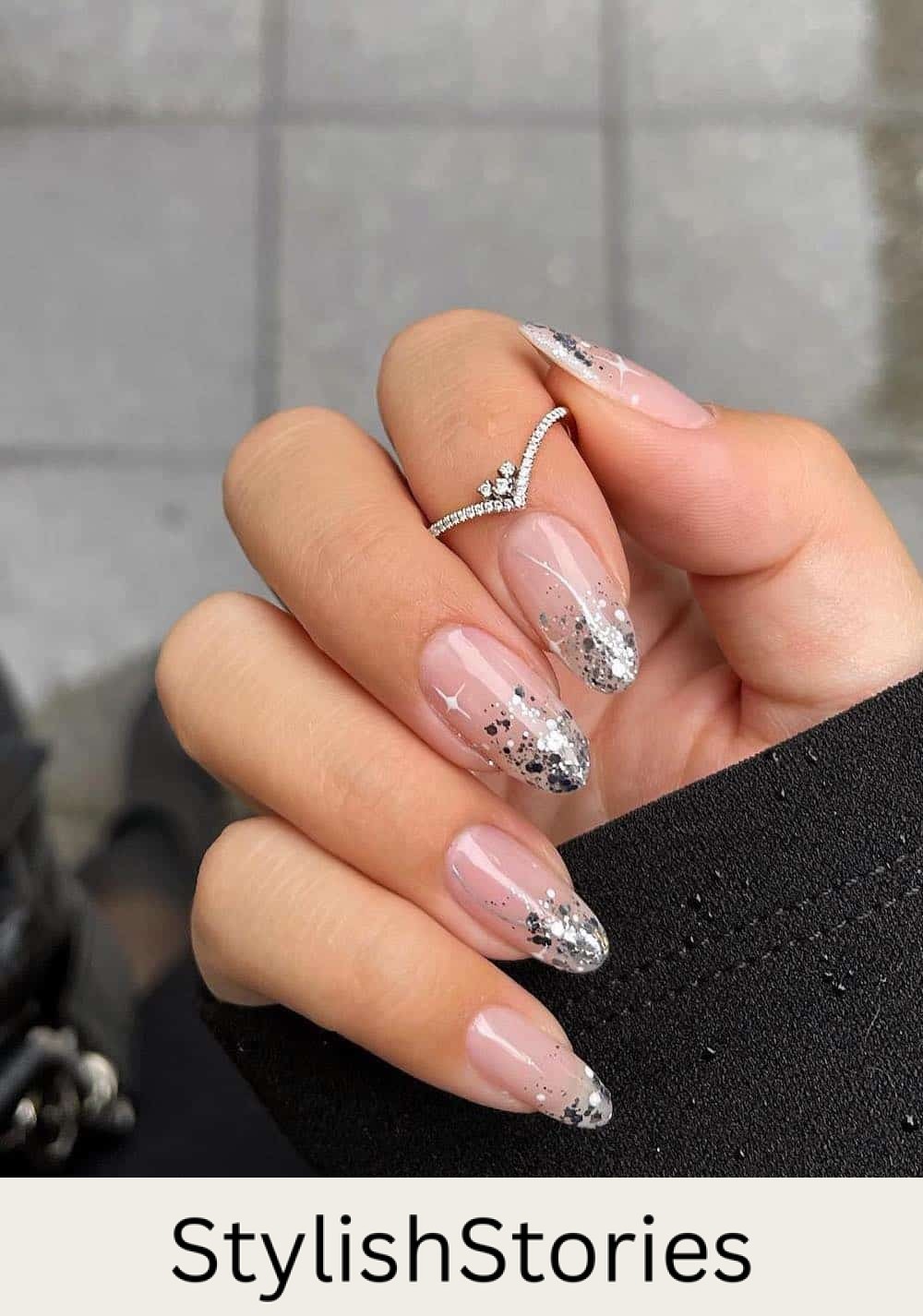 long nude almond nails with chunky glitter tips and white sparkles