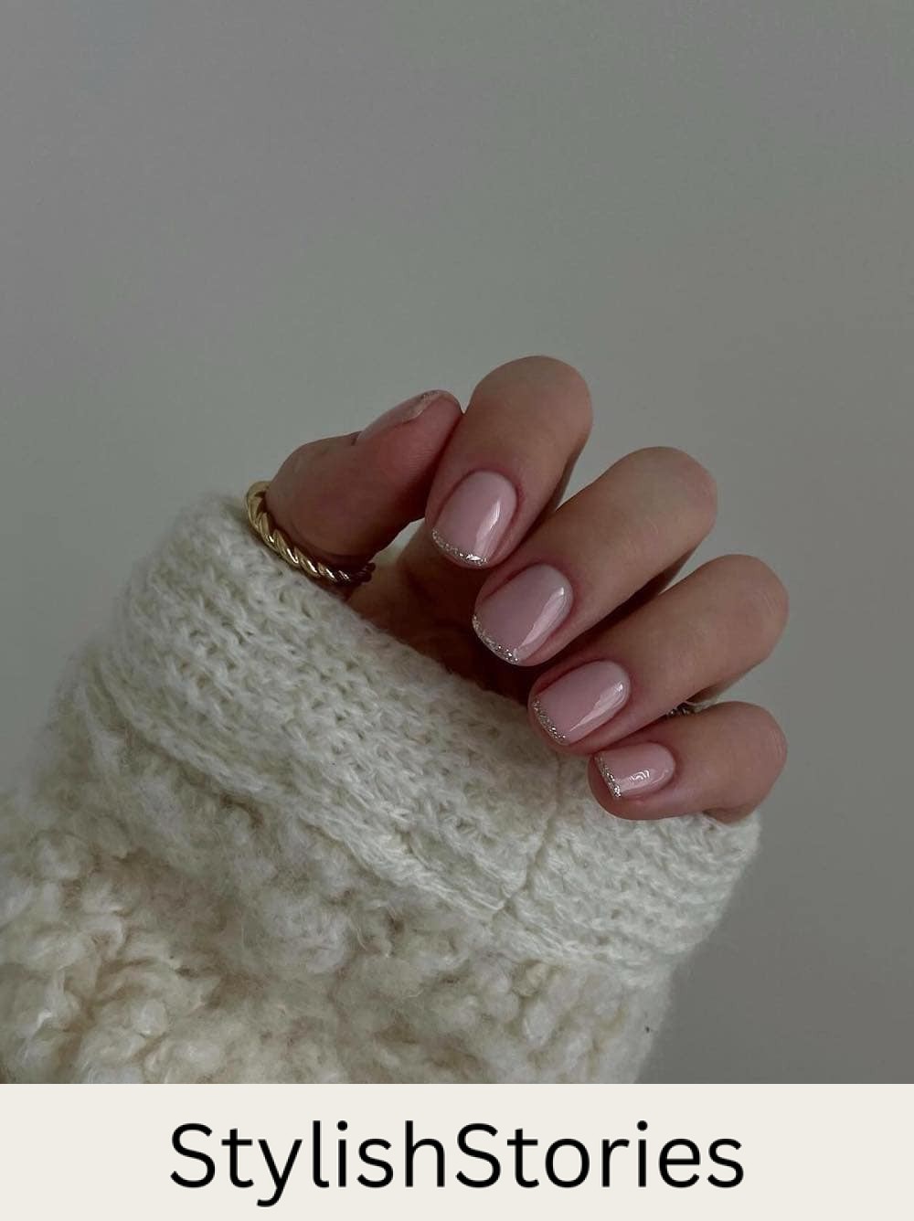 short light pink nails with thin silver glitter tips