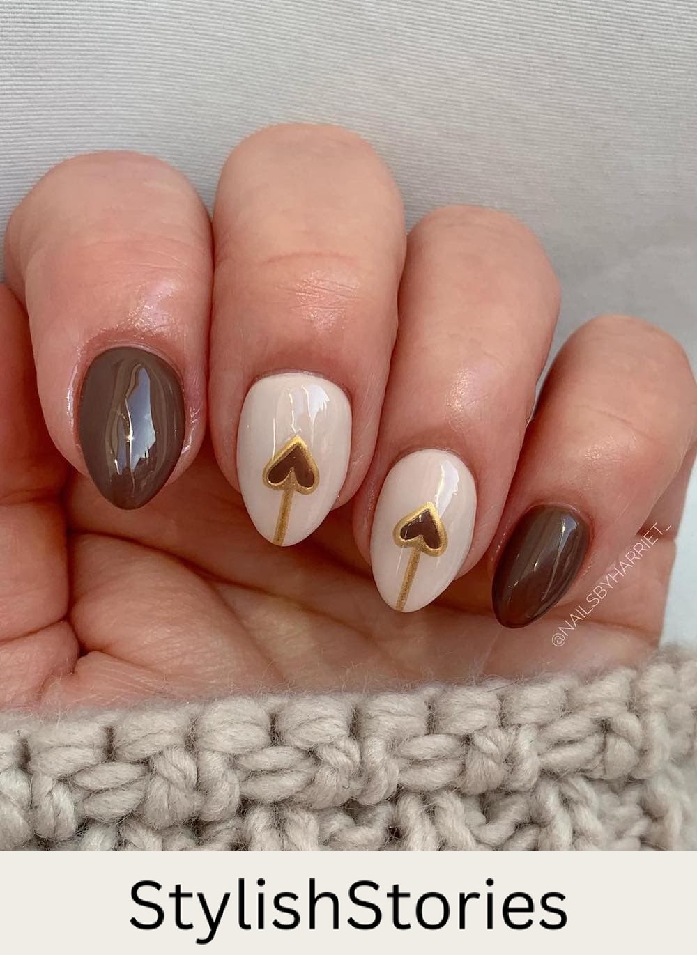 short cream and brown nails with heart accents and gold details