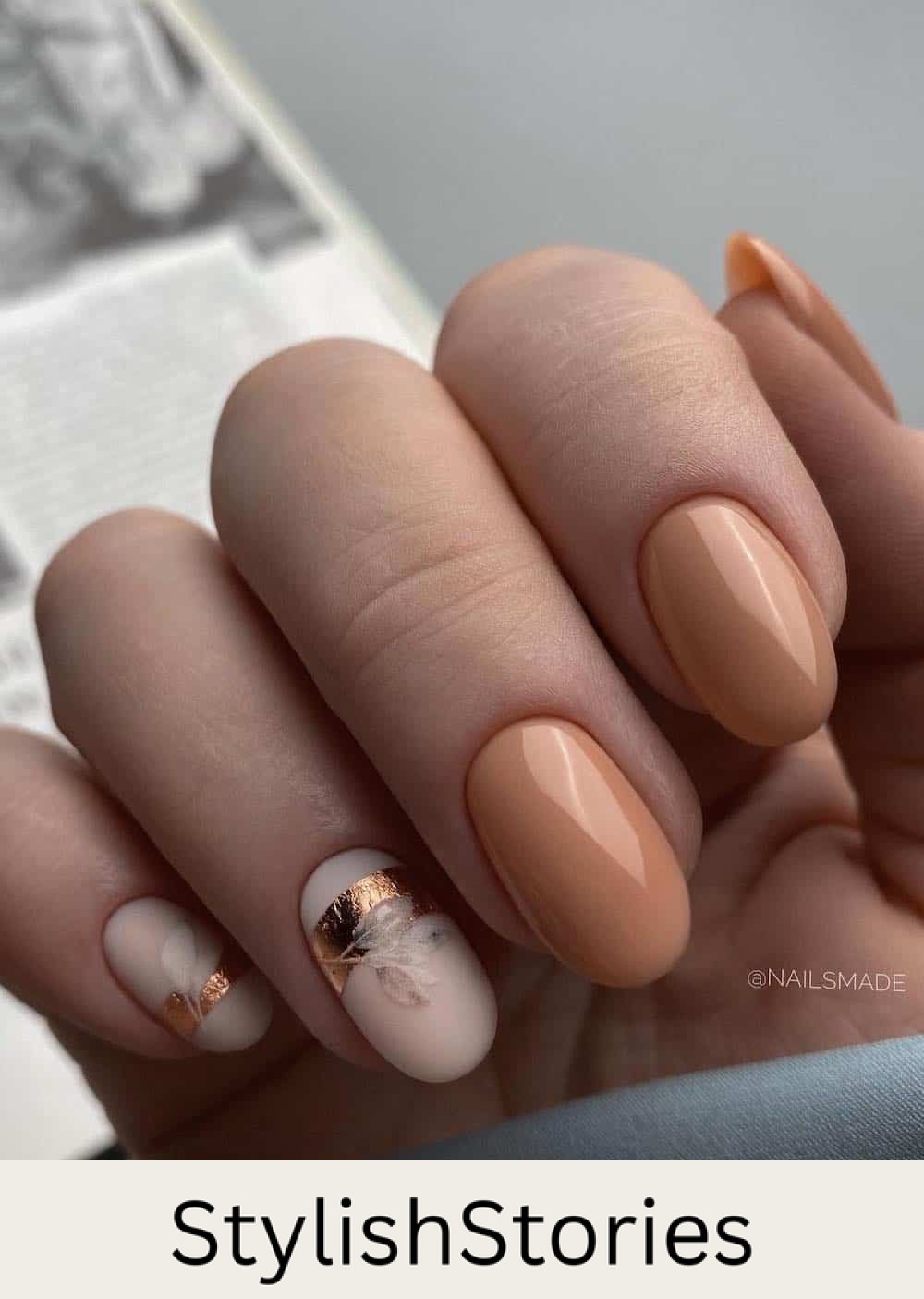 short beige nails with matte nude accent nails featuring botanical art and gold foil