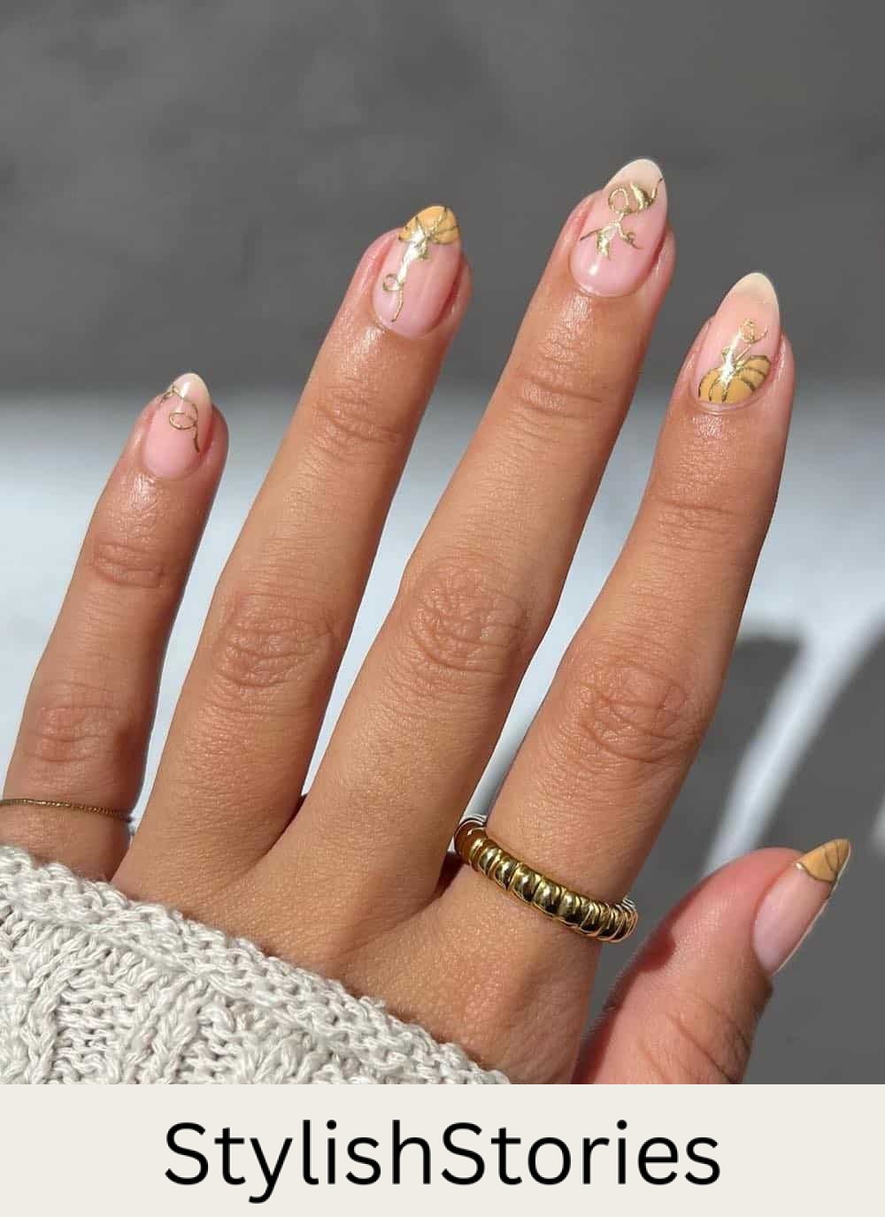short nude nails with pumpkin nail art