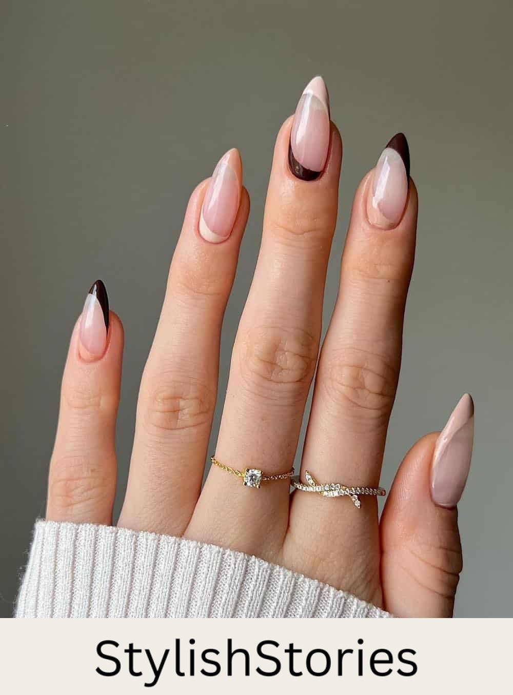 nude almond nails with brown and beige french tips and reverse french tips