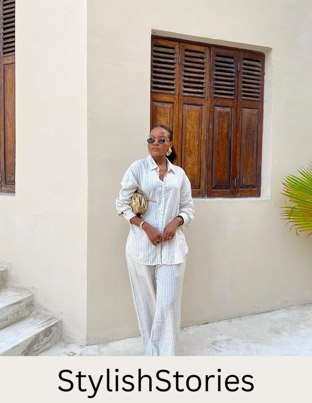 Woman wearing a white striped linen set.