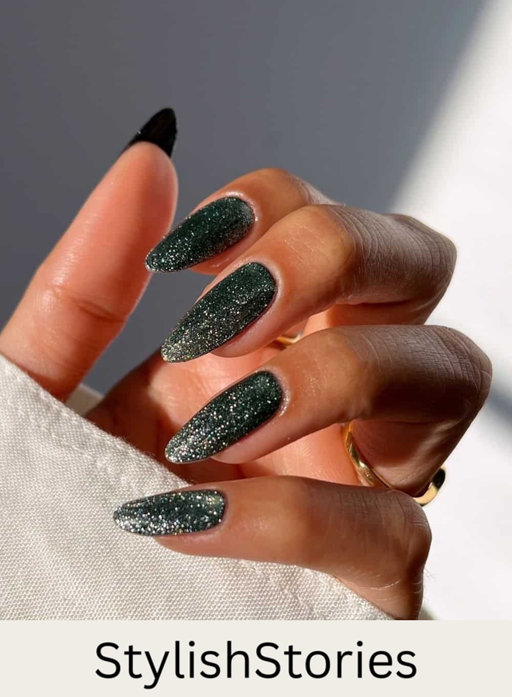 long shimmering black almond nails